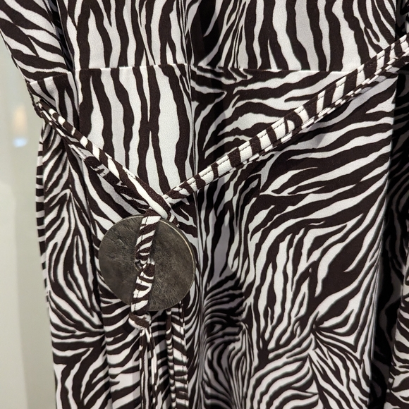 Figure flattering zebra stripe faux wrap dress. - Picture 3 of 5